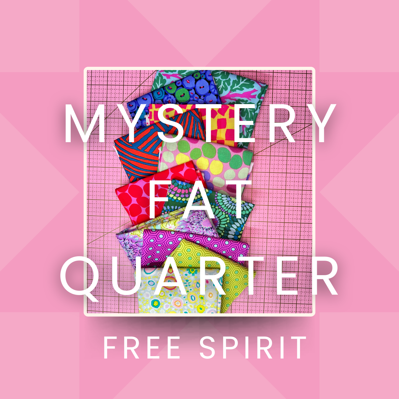 bundle of fat quarters stacked on cutting pink mat